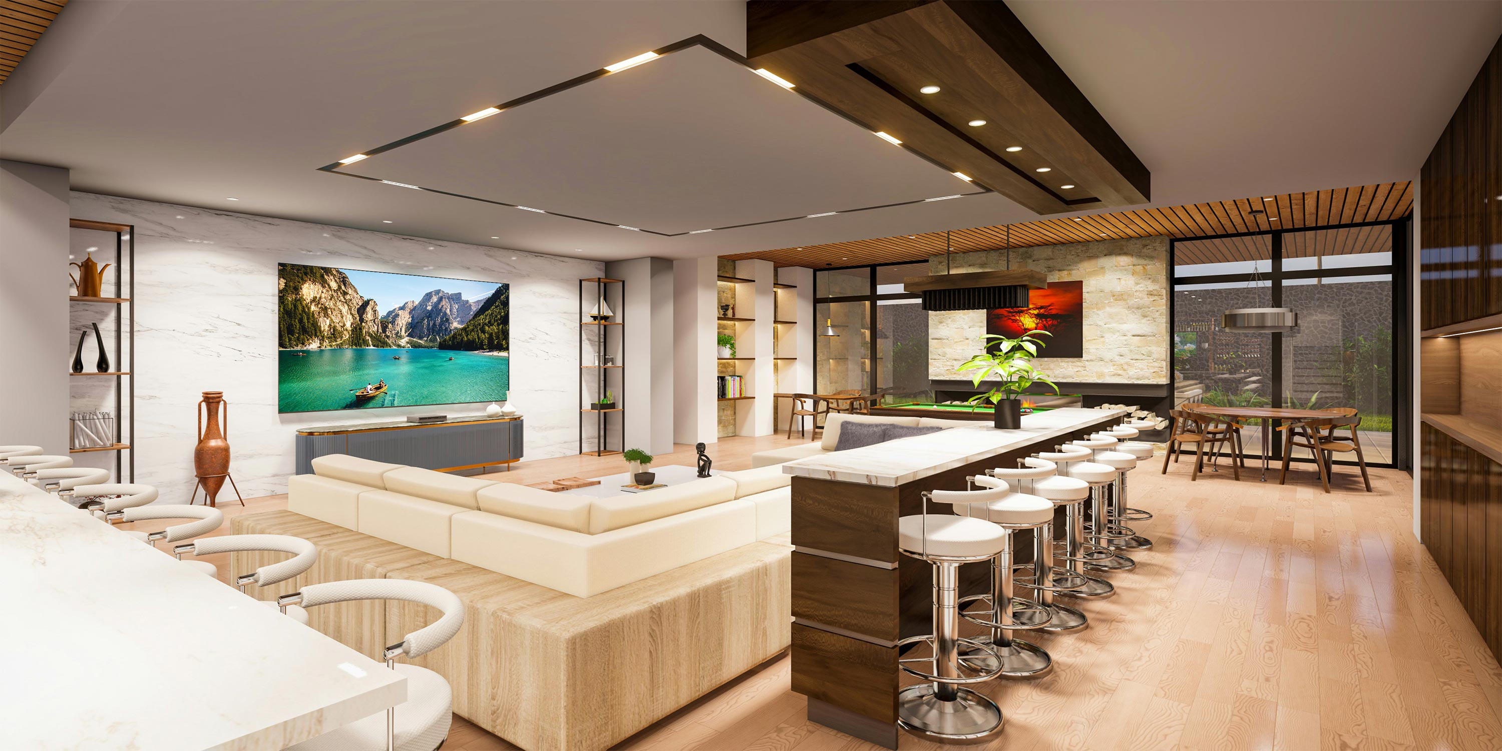 Modern family room with a large TV, bar seating, and open layout